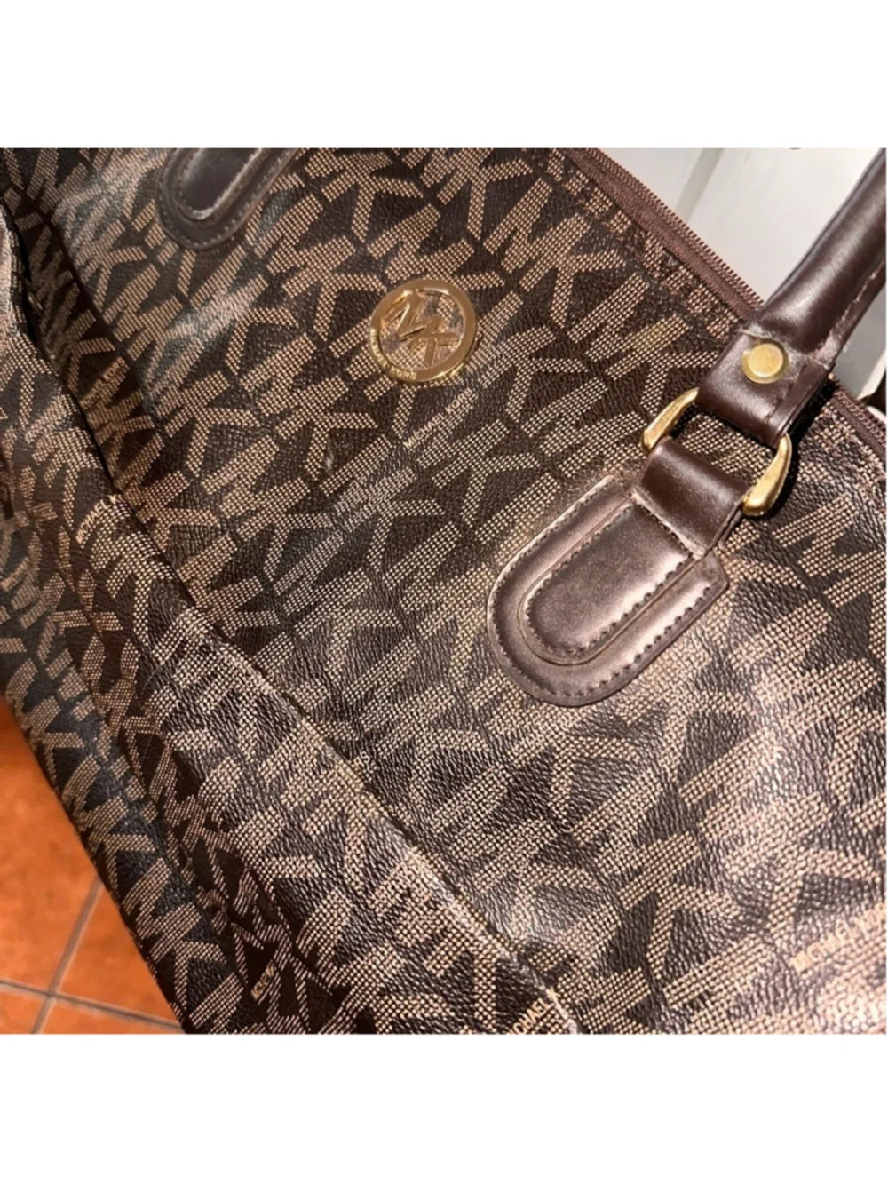 Michael Kors brown Monogram duffel bag - Picture 2 of 12